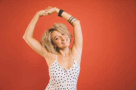 Woman of caucasian appearance stretch oneself at studioの写真素材