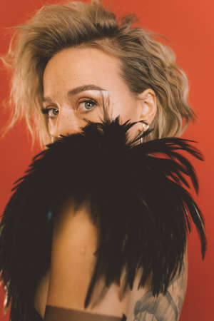 Woman looking at camera over shoulder