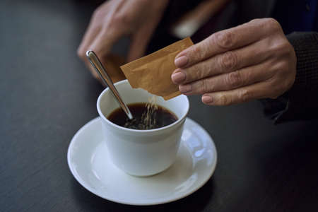 Little sachet of sugar to sweeten your coffeeの写真素材