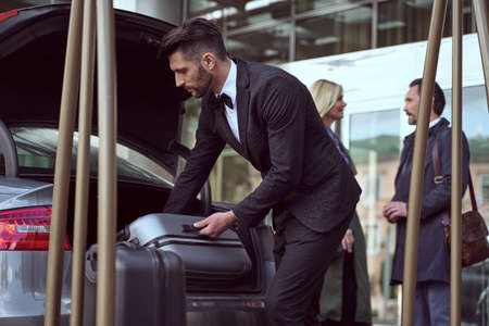 One of the hotel porters duties is handling guests luggageの写真素材