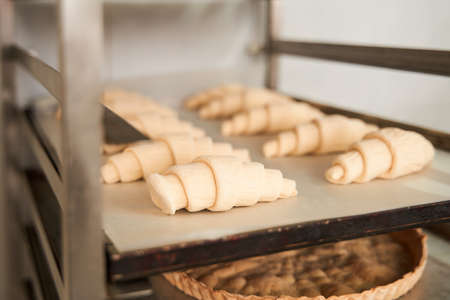 Bagels standing at the tray at the trolley at confectionery