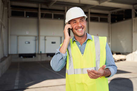 Engineer talking on telephone