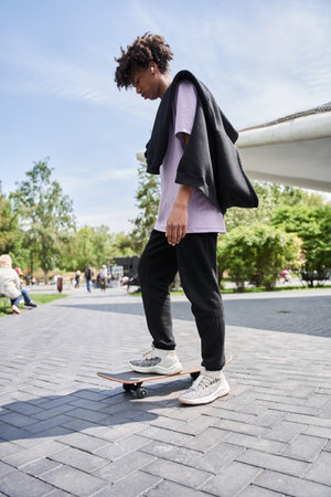 Skateboarder wearing casual clothes preparing to the riding at the skateboardの写真素材