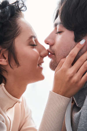 Man and woman together before a few seconds to a kissの写真素材