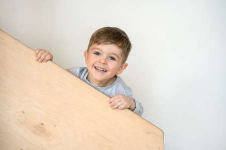 Boy feeling playful at the stairsの写真素材