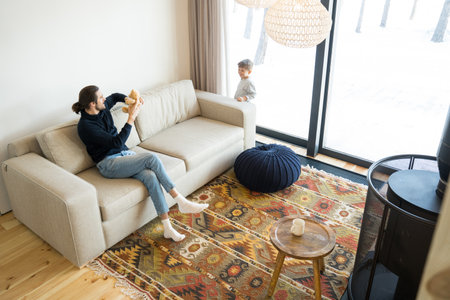 Father playing with kid boy togetherの写真素材