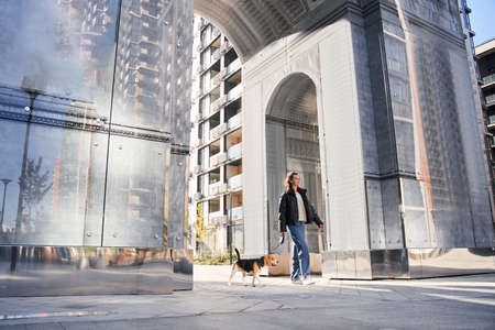 Woman walking with her dog