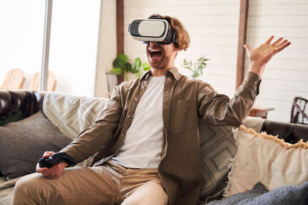 Man getting experience using VR-headset glasses