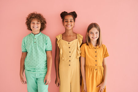 Multiracial friends standing and looking at cameraの写真素材