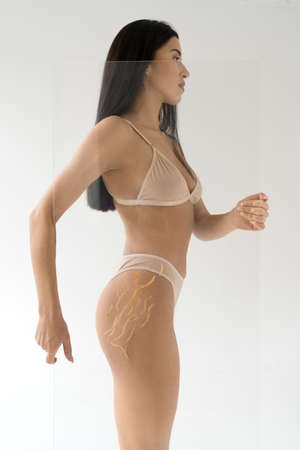 Strong woman holding transparent glass and talking about imperfections of the skin