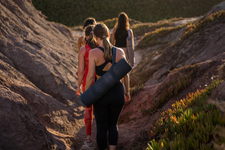 Strong woman going at morning yoga with her friendsの写真素材