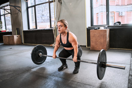 Midget woman exercise workout at gym fitness training sportの写真素材