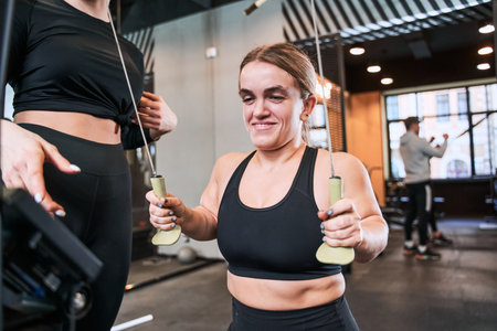 Female with autosomal disorder training with pleasure smile