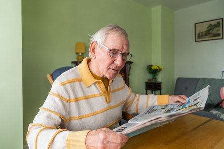 Happy old couple at home.の写真素材