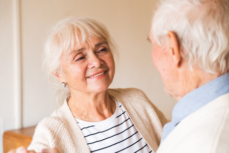 Happy old couple at homeの写真素材