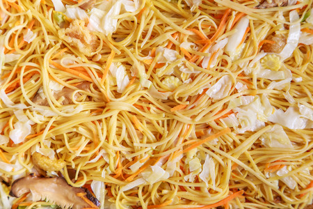 fried noodle with vegetable texture backgroundの写真素材