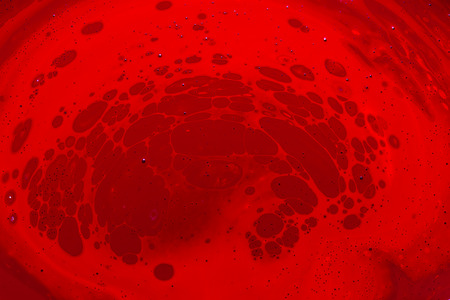 abstract red paint surface backgroundの写真素材