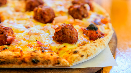 meatballs on pizza backgroundの写真素材