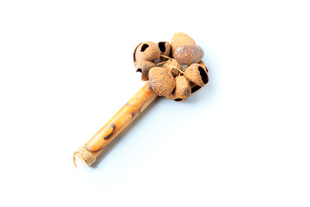 Local Balinese Indonesian hand held percussion instruments made from chestnuts and bambooの写真素材