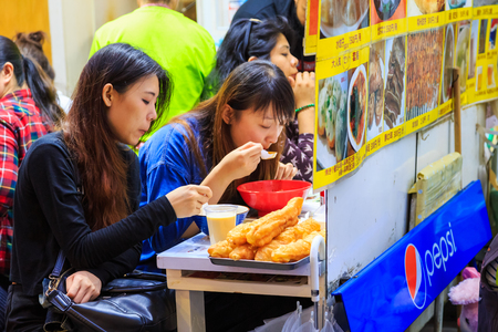 Tokyo, Japan - October 19, 2016: unidentified tourist having dinner at Ameya Yokocho the famous shopping area of Ueno District, Tokyo.のeditorial素材