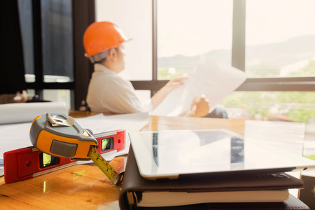 Team of engineers working together in a architect office.