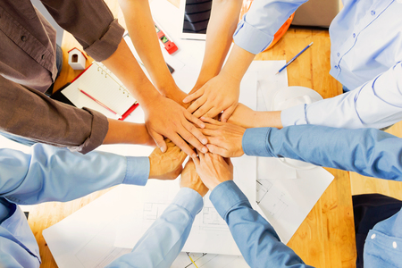 Team of engineers working together in a architect office.
