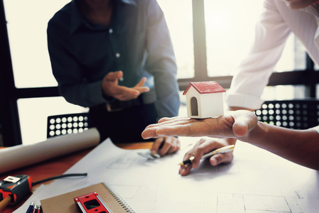 Team of engineers working together in a architect office.の写真素材