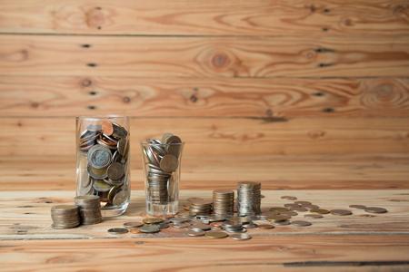 Saving money concept - money coin stack growing businessの写真素材