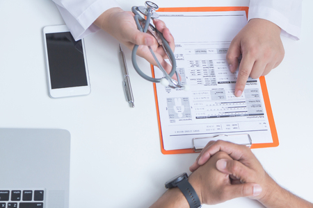 Doctor and patient are discussing something.- Health care conceptの写真素材