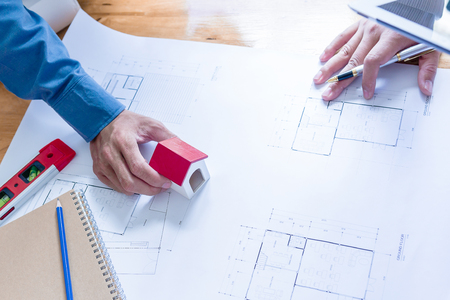 Team of engineers working together in a architect office.- Architectural Conceptの写真素材