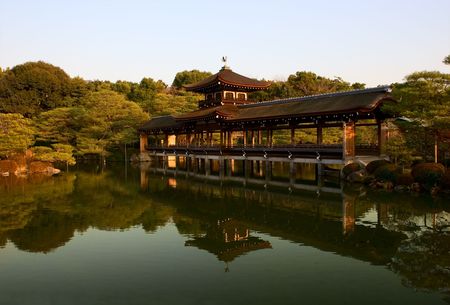 Wooden bridge of shrine pond in Kyoto, Japan.