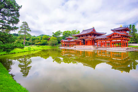 Red Phoenix Hall Reflection in Small Pond of Byodoin Temple in Summer, Uji, Kyoto, Japanのeditorial素材