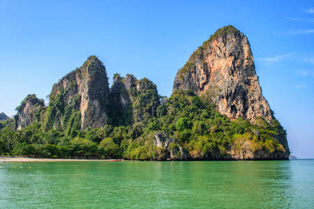 Great Limestone Rock on Railay Beach in Summer Blue Sky Day, Krabi, Thailandの写真素材