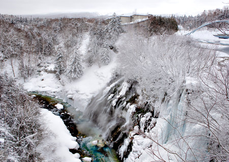 Scenic landscape of Shirahige Waterfalls in winter, Biei, Hokkaido, japanの写真素材