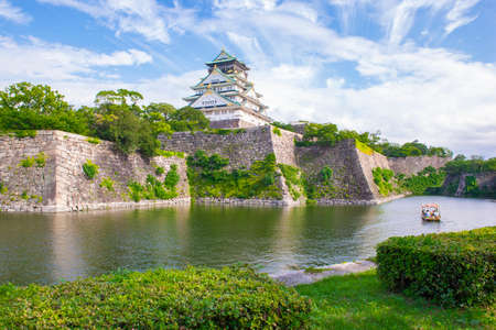 Japan - July 19, 2019 : Scenic view of Osaka Castle surrounding with small moat in Summer, Osaka Castle Park, Osakaのeditorial素材