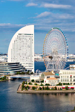 Japan - November 4, 2019 : Scenic view of Yokohama Harbour with Skyscrapers Buildings and Giant Ferris Wheel in Autumn Blue Sky Day, Yokohamaのeditorial素材