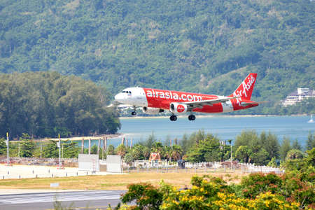 Thailand - May 9, 2019 : Air Asia Airbus 320 Aircraft landing at Phuket International Airport, Phuketのeditorial素材