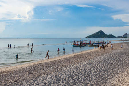 Thailand - July 1, 2020 : Tourists enjoy sightseeing and Playing at Hau Hin Beach with Khao Takiab Mountain Background  in Summer, Phuket, Thailandのeditorial素材