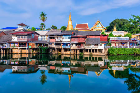 Thailand - March 27, 2021 : Scenic view reflection of House and Temple Chanthaboon Waterfront Community located at Chanthaboon Riverside, Landmark of Chanthaburiのeditorial素材