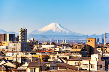 Japan - January 31, 2019 : Japanese Cityscape of Kumagaya city with Fuji Mountain Background taken from Joetsu Line Shinkansen Bullet Train, Kumagayaのeditorial素材