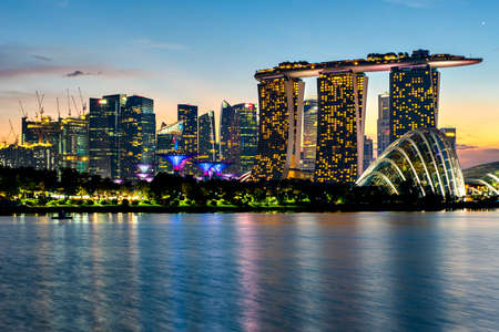 Singapore - August 10, 2019 : Illumination of Marina Bay Sands and Gardens by the bay, Landmark of Singapore at Sunset, Marina Bay, Singaporeのeditorial素材