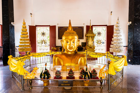 Thailand - April15, 2019 : Golden Buddha Statue Half-buried in ground of main chapel of Wat Phra Thong Temple, Thalang, Phuketのeditorial素材