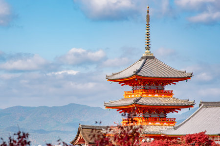 Japan - November 23, 2019 : The Three Storeys Pagoda among Red maple leaves in autumn, located in the Garden of Kiyomizu-dera temple, Kyotoのeditorial素材