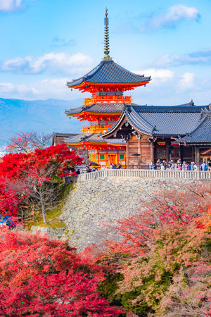 Japan - November 21, 2022 : Scenic landscape of Red Pagoda among colorful maple tree garden in autumn at Kiyomizudera Temple, Kyotoのeditorial素材