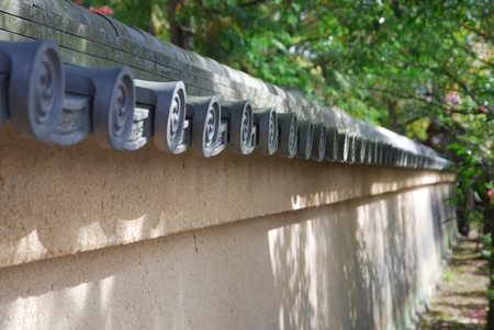 Roof on the wall in Japanese temple. Selective focus.の写真素材
