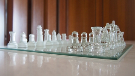 beautiful glassy chessboard and all chessmanの写真素材