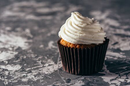 Cupcake on a gray background.の写真素材