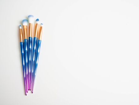 Classic blue eye shadow brushes isolated on white background with space for copy space.の写真素材