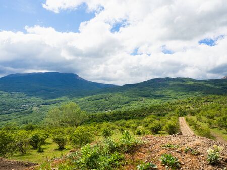 Crimean mountains in the clouds. Demerdzhi and Chatyr Dag. Valley of ghosts.の写真素材