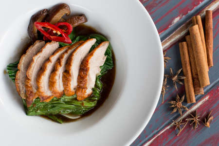 Duck with kale fried in oyster sauceの写真素材